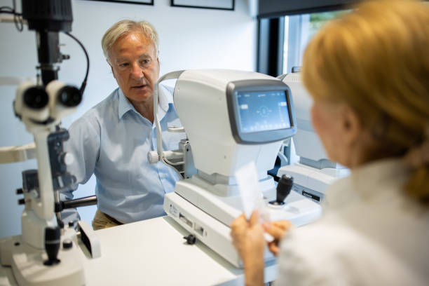 istock Senior man undergoing retinal scan on eye exam at medical clinic 1340040713
