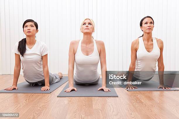 Interracial Group Of Three Beautiful Women In Yoga Position Stock Photo - Download Image Now