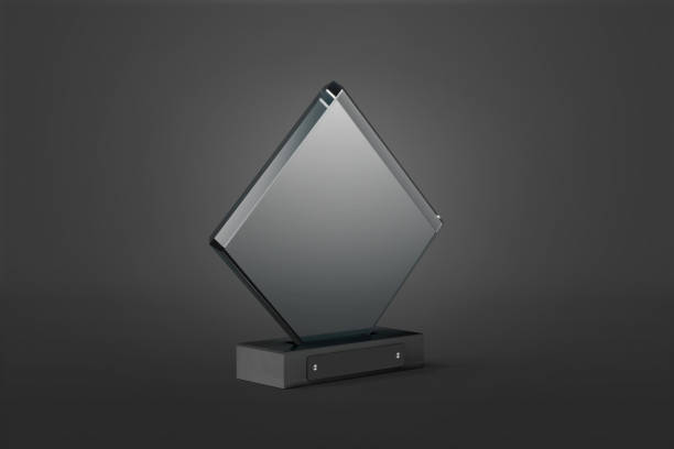 Blank glass rhombus award mockup, dark background Blank glass rhombus award mockup, dark background, 3d rendering. Empty crystal transparent trophy for first reward or achievement mock up. Clear glassy present for laureate template. laureate stock pictures, royalty-free photos & images