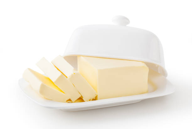 istock Butter on white butter dish isolated on white background with clipping path 1340043641