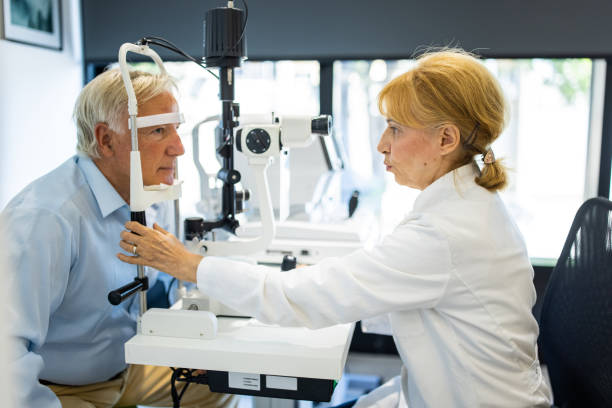 istock Senior man undergoing intraocular pressure exam at optometrist office 1340045824