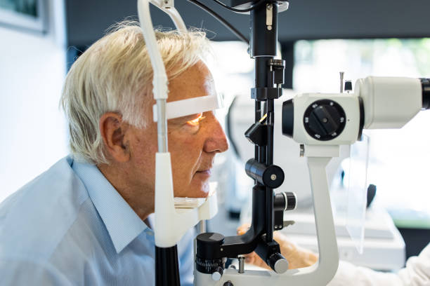 istock Senior man undergoing intraocular pressure exam at optometrist office 1340046539