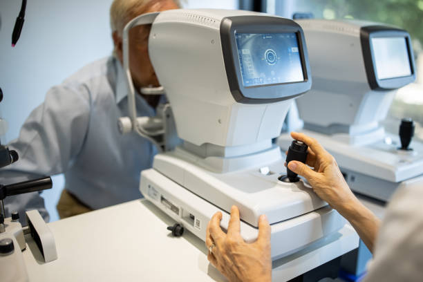 istock Senior man undergoing retinal scan on eye exam at medical clinic 1340047169