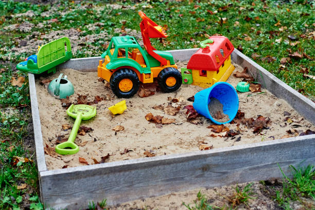 istock Children sandbox with colorful toys 1340047461