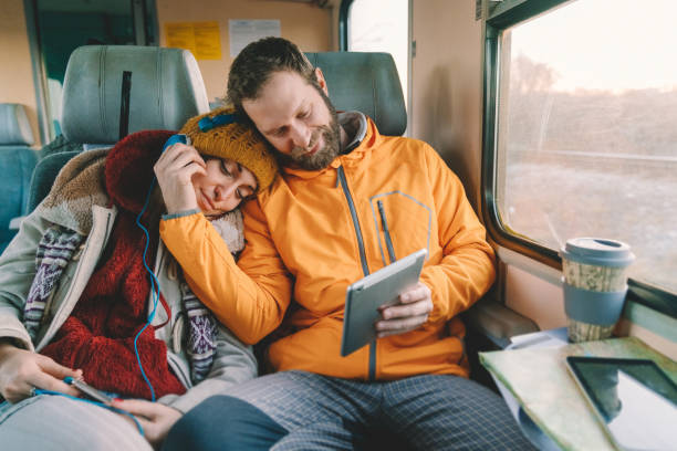 istock Couple traveling with train 1340052439