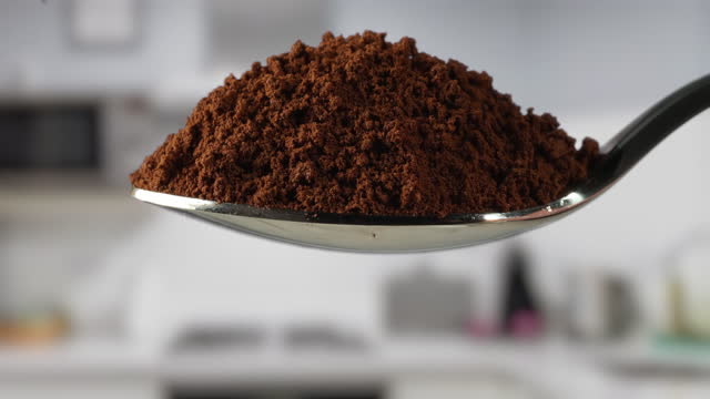 a spoonful of granulated coffee