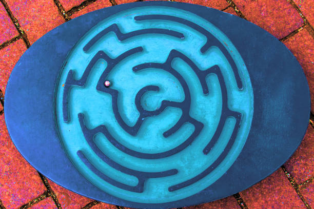 istock Circle maze. Labyrinth with entry and exit. Abstract find the way out concept. 1340055212