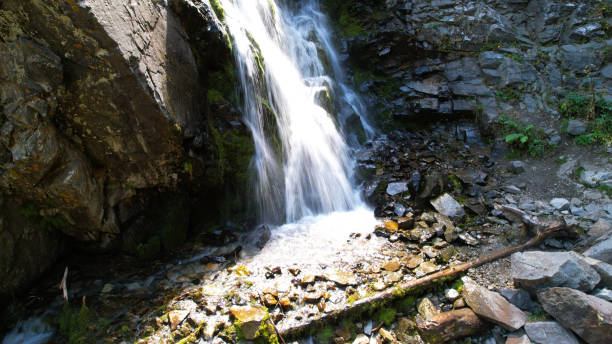 istock A mountain waterfall in a rocky gorge 1340059768
