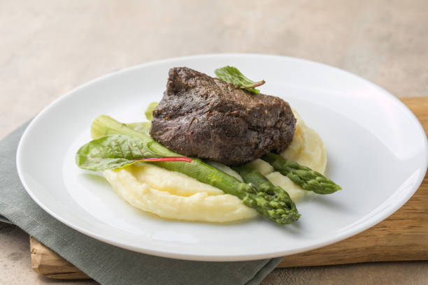 istock Traditional steak and mashed potatoes with blanched asparagus 1340060145