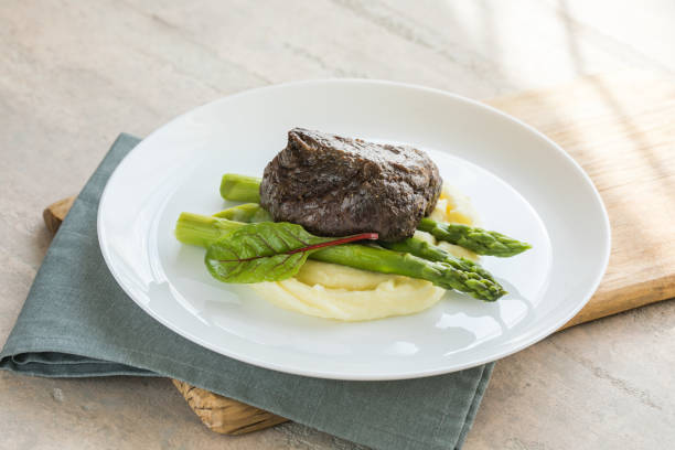 istock Traditional steak and mashed potatoes with blanched asparagus 1340060389