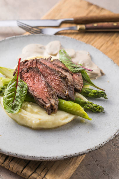 istock Traditional steak and mashed potatoes with blanched asparagus 1340060954