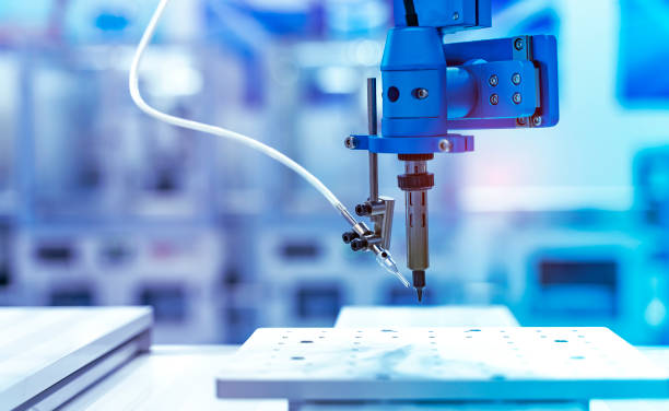 istock automatic robot for print circuit board (PCB)assembly machine during soldering or welding part 1340061338