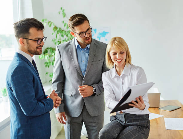 istock young business people meeting office teamwork group success corporate discussion team group desk businesswoman document file planning 1340064830