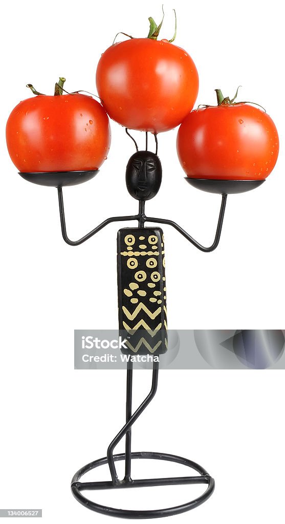 Figura con tomates - Foto de stock de Agarrar libre de derechos