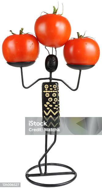 Figura Con Tomates Foto de stock y más banco de imágenes de Agarrar - Agarrar, Alimento, Arte