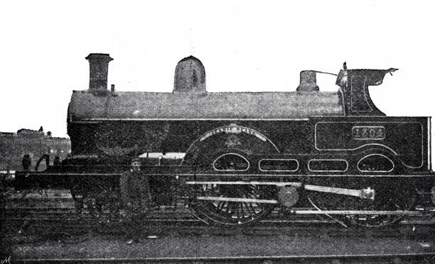 istock Jeanie Deans locomotive with driver standing in front of it 1340070213