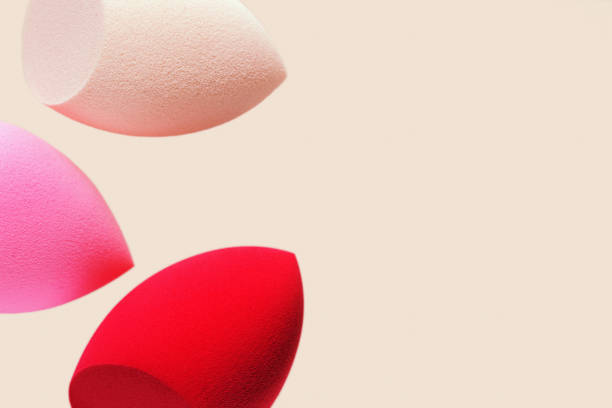 istock Bright cosmetic beauty sponges different form Red and pink colored makeup tools for tone cream, foundation, concealer. 1340078599