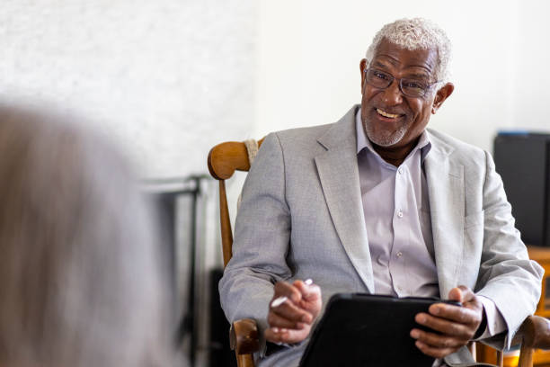 istock Financial Advisor Meeting with Client In Home 1340080421