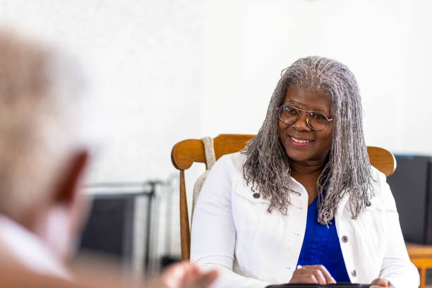 istock Financial Advisor Meeting with Client In Home 1340080475