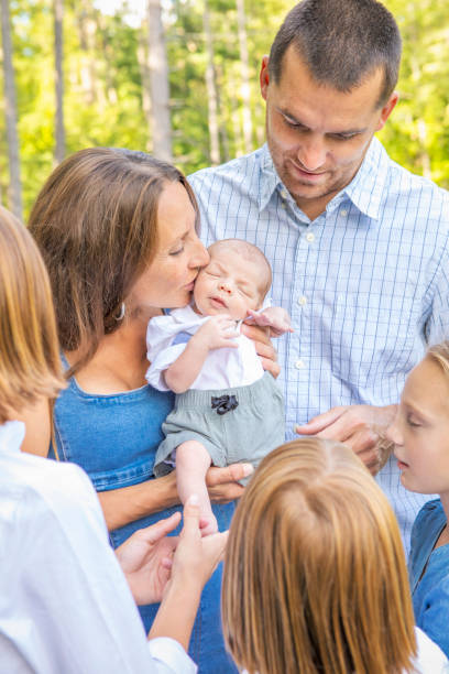 istock Beautiful Family Bonding With Newborn 1340080580