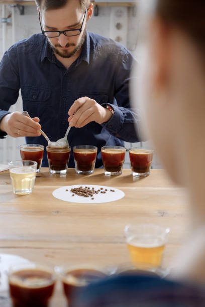 istock Barista examining freshly brewed coffee 1340081696