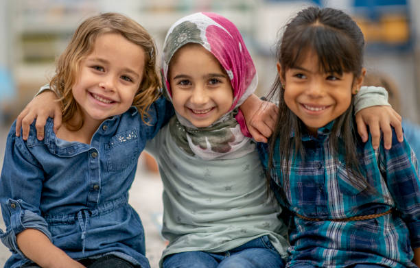 istock Three multi ethnic preschool girls 1340083629
