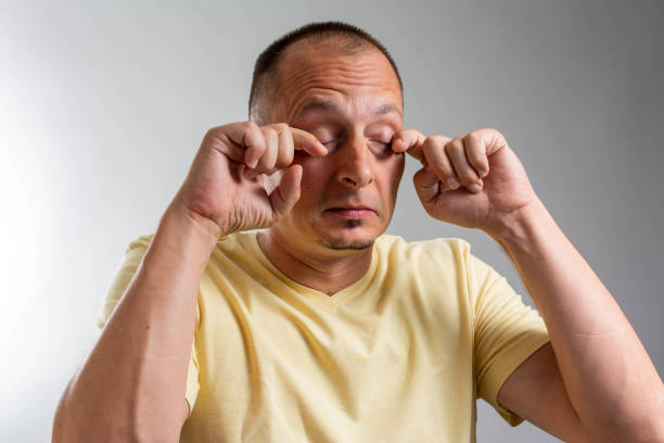 istock People, tiredness and covid-19 health problems concept. Coronavirus symptom. 1340089301