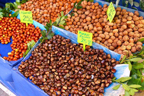 Istanbul, Turkey - October 10, 2019: Sale of organic chestnuts in street market. Selective focus
