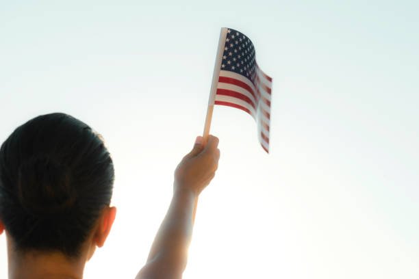 istock Woman with Flag 1340098791