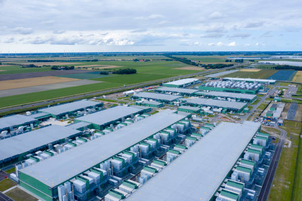 drone view of microsoft data centre drone  aerial view of new Mmcrosoft datacenters . the huge buildings are located along highway a7 in the province Noordholland near wieringerwerf. data center stock pictures, royalty-free photos & images