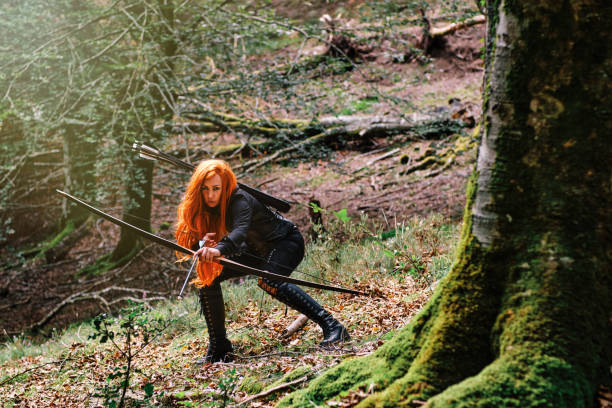 istock Warrior woman with hunting bow 1340100586