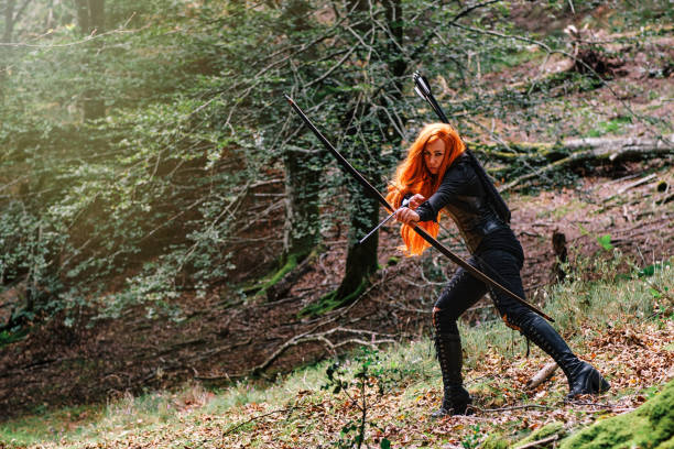 istock Warrior woman with hunting bow 1340101220