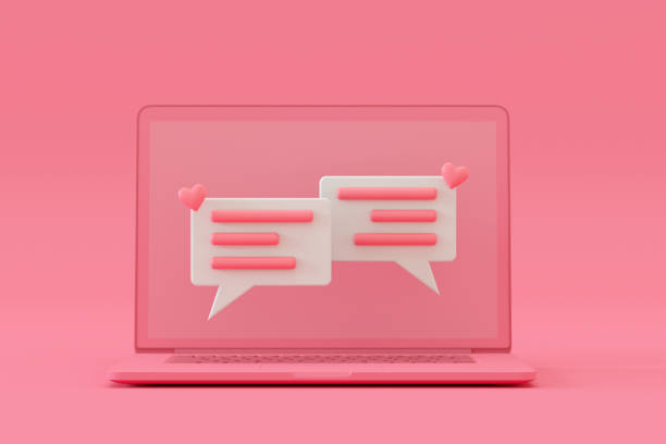 istock Speech Bubble with Hearts on Laptop, Pink Background 1340101764