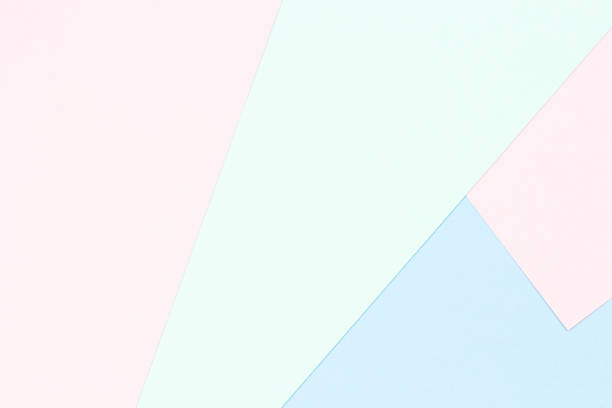 istock Abstract colored paper texture background. Minimal geometric shapes and lines in pastel pink, light blue and green colors 1340104276