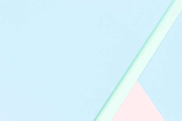 istock Abstract colored paper texture background. Minimal geometric shapes and lines in pastel pink, light blue and green colors 1340104286