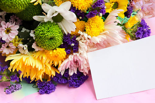 greeting card design. autumn bouquet. bouquet of  chrysanthemums on a white background and space for text. invitation. congratulation