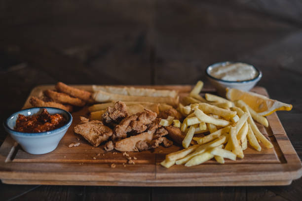 istock Fried chicken and french fries 1340109024