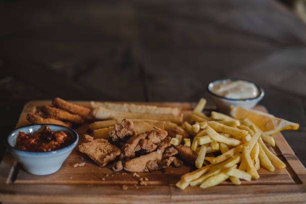 istock Fried chicken and french fries 1340109113