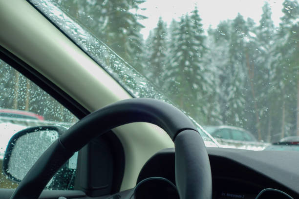 istock Car driving through Winter Landscape 1340112699
