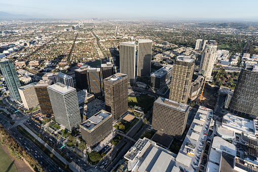 Los Angeles, California, USA - April 18, 2018:  Aerial view of Century City towers with downtown LA in background.