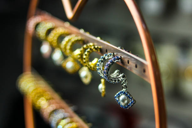 Metal frame with hanging earrings