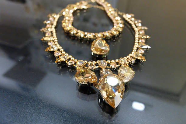 istock Double-wrap golden necklace with pendant 1340115941