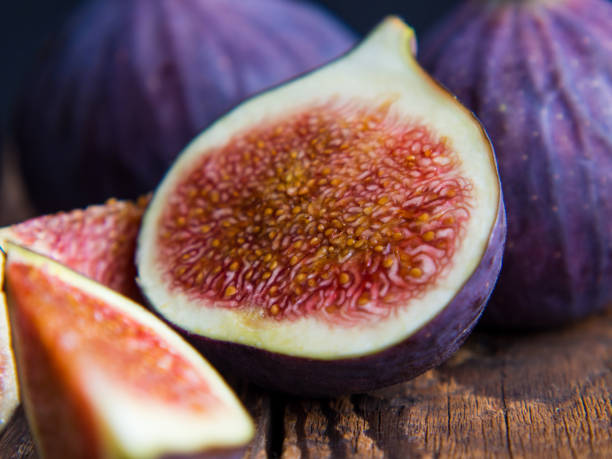 istock Still life with fresh figs on an old table 1340120505