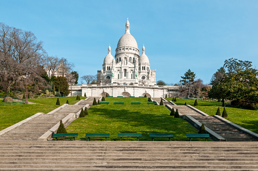Paris : view on Sacré Coeur basilica and Montmartre hill without people, during Covid-19 lockdown. Paris, in France. March 29, 2021.