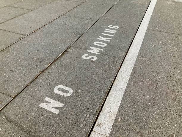 istock No smoking inscription on asphalt 1340122347