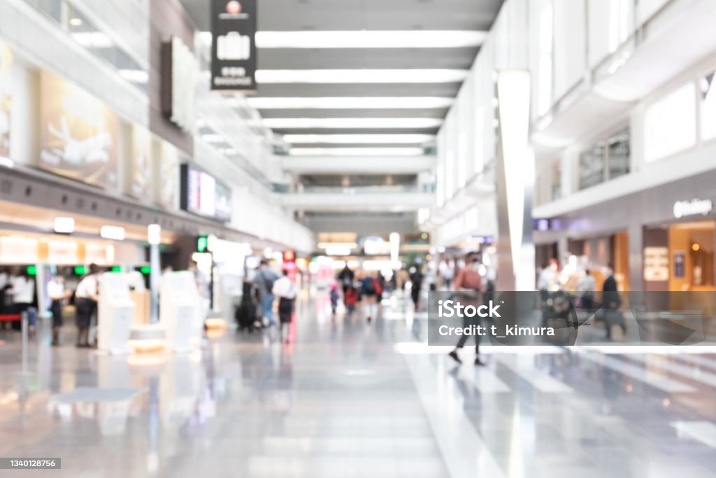 Defocused hallway Defocused modern airport Shopping Mall Stock Photo