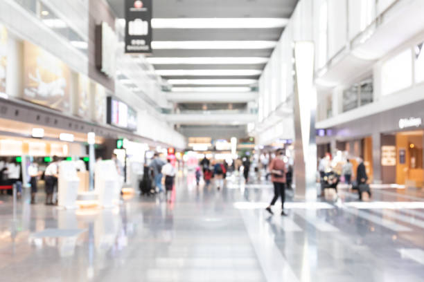 Defocused hallway Defocused modern airport shopping mall stock pictures, royalty-free photos & images