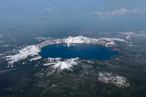 An aerial view of Crater Lake in Oregon. Crater lake formed in the caldera of an exploded stratovolcano in the Cascade Range