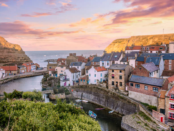 Staithes in Yorkshire Pretty little coastal fishing village on East coast of Yorkshire fishing village stock pictures, royalty-free photos & images