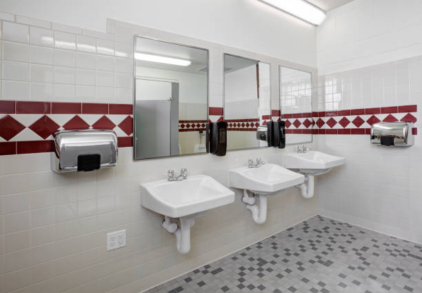 istock Wash basins in  a public restroom 1340136967